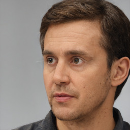 Neutral white adult male with short  brown hair and brown eyes