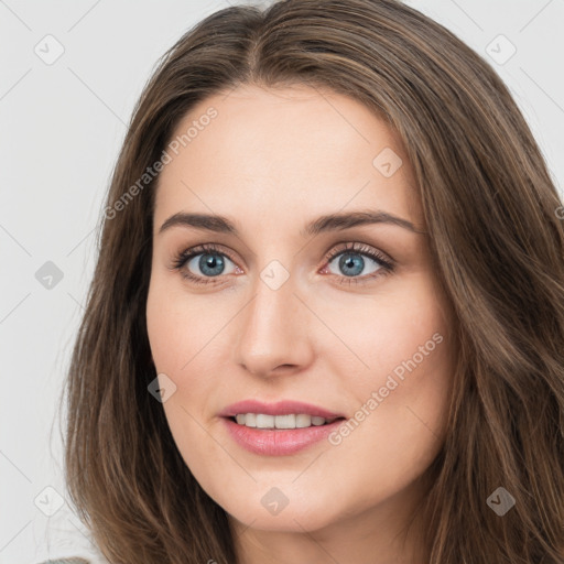 Joyful white young-adult female with long  brown hair and green eyes