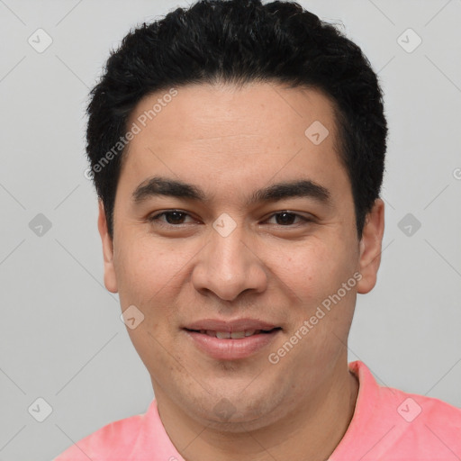 Joyful white young-adult male with short  black hair and brown eyes