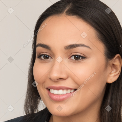 Joyful white young-adult female with long  brown hair and brown eyes