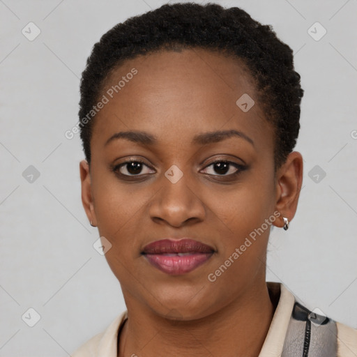 Joyful black young-adult female with short  brown hair and brown eyes