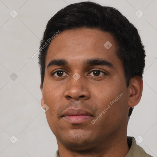 Neutral black young-adult male with short  black hair and brown eyes