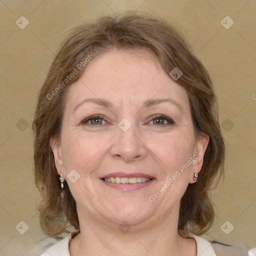 Joyful white adult female with medium  brown hair and grey eyes