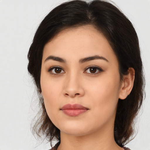 Neutral asian young-adult female with long  brown hair and brown eyes