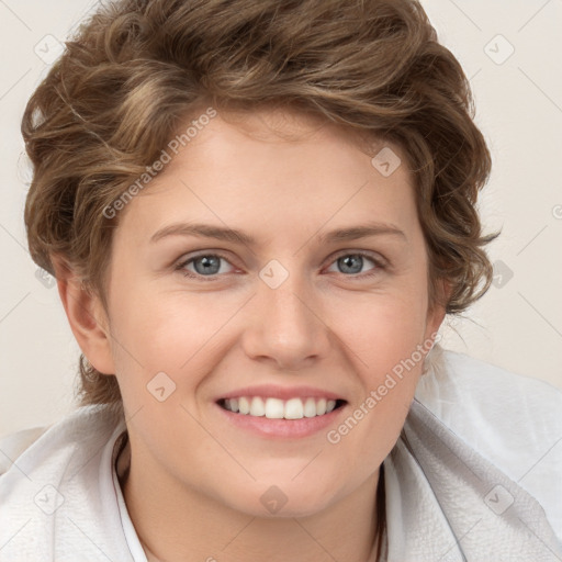 Joyful white young-adult female with short  brown hair and blue eyes