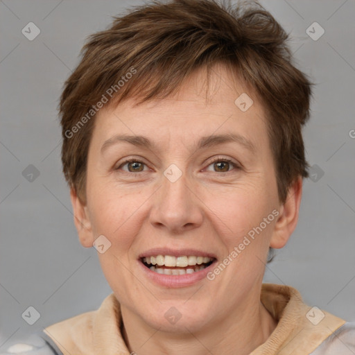 Joyful white adult female with short  brown hair and grey eyes