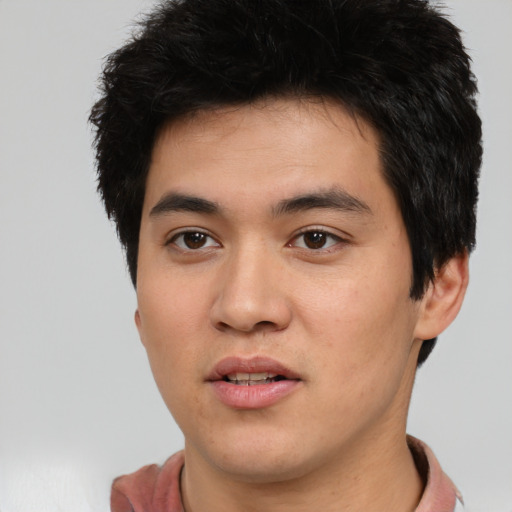 Neutral white young-adult male with short  black hair and brown eyes