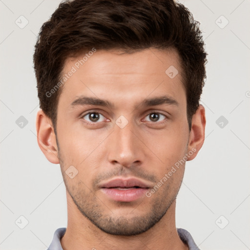 Neutral white young-adult male with short  brown hair and brown eyes