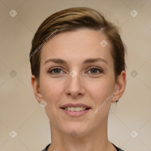 Joyful white young-adult female with short  brown hair and grey eyes