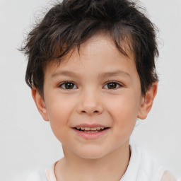 Joyful white child male with short  brown hair and brown eyes