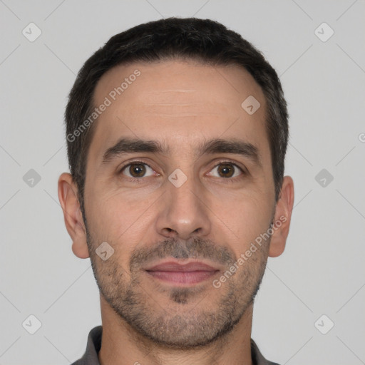 Joyful white young-adult male with short  black hair and brown eyes