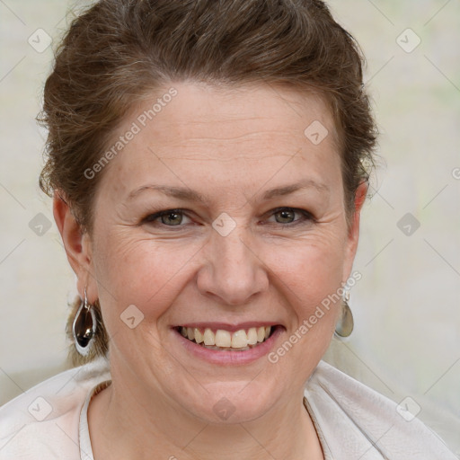 Joyful white adult female with short  brown hair and brown eyes