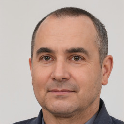 Neutral white adult male with short  black hair and brown eyes