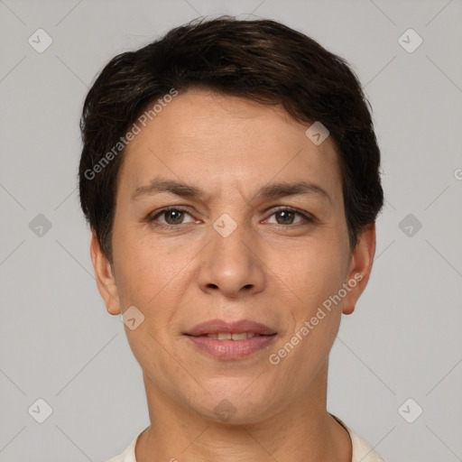 Joyful white adult female with short  brown hair and brown eyes