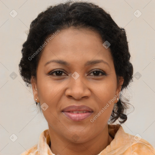 Joyful black adult female with medium  brown hair and brown eyes