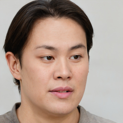 Neutral asian young-adult female with short  brown hair and brown eyes