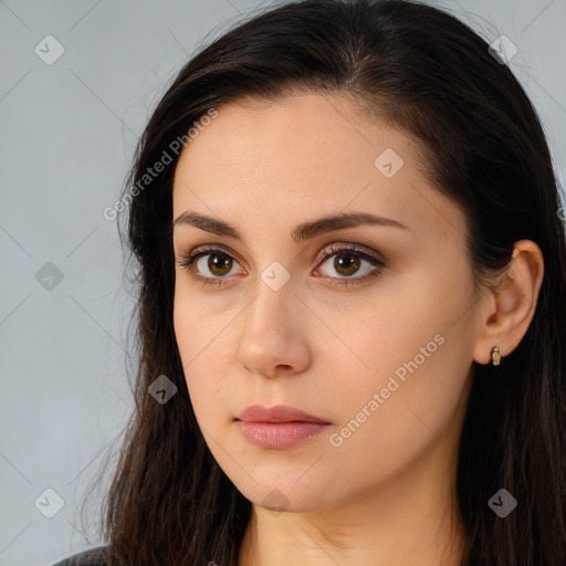 Neutral white young-adult female with long  brown hair and brown eyes