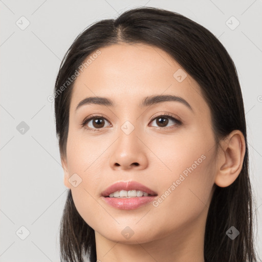 Joyful asian young-adult female with long  brown hair and brown eyes