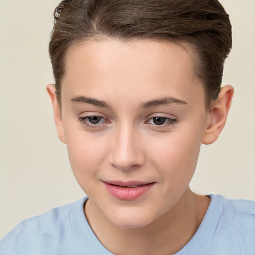 Joyful white child female with short  brown hair and brown eyes