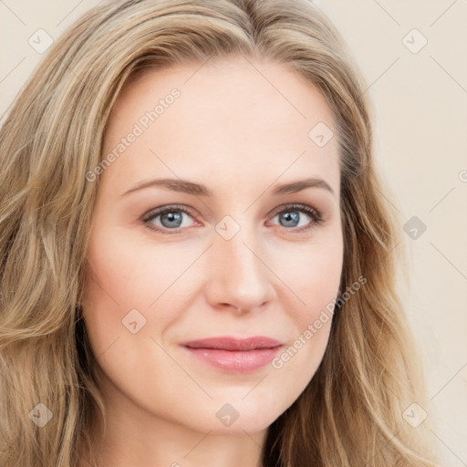 Joyful white young-adult female with long  brown hair and blue eyes