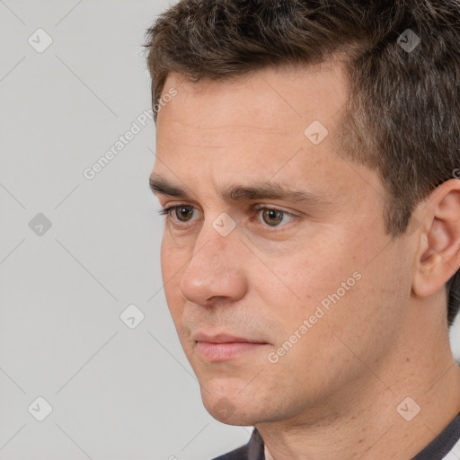 Neutral white young-adult male with short  brown hair and brown eyes