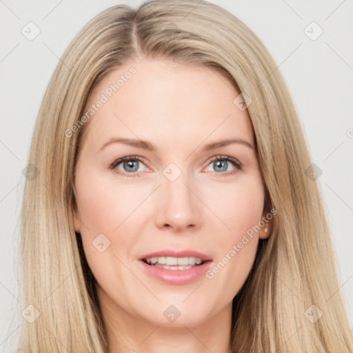 Joyful white young-adult female with long  brown hair and blue eyes