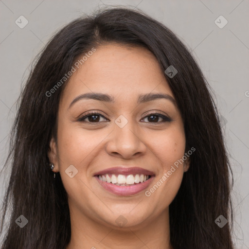 Joyful latino young-adult female with long  brown hair and brown eyes