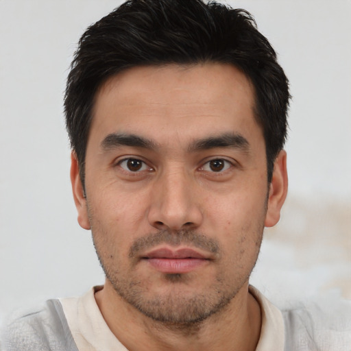 Neutral white young-adult male with short  black hair and brown eyes