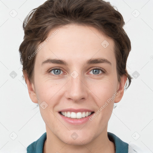 Joyful white young-adult female with short  brown hair and grey eyes