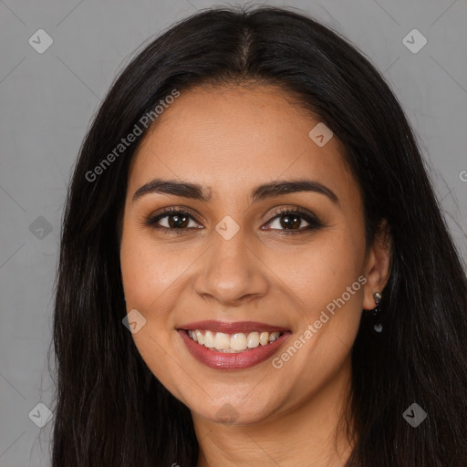 Joyful latino young-adult female with long  brown hair and brown eyes