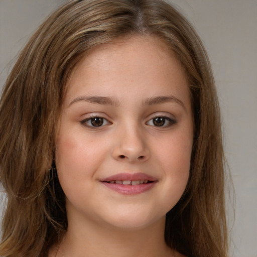 Joyful white child female with long  brown hair and grey eyes