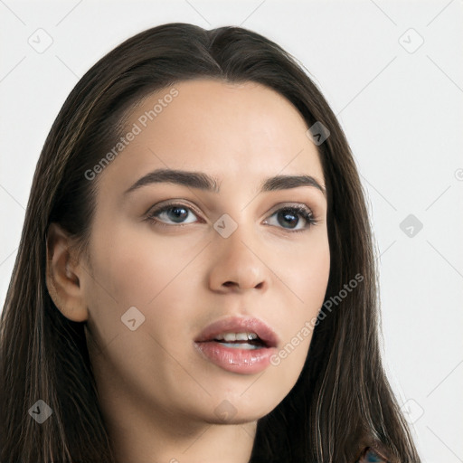 Neutral white young-adult female with long  brown hair and brown eyes