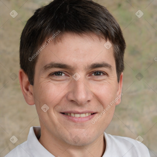 Joyful white adult male with short  brown hair and brown eyes