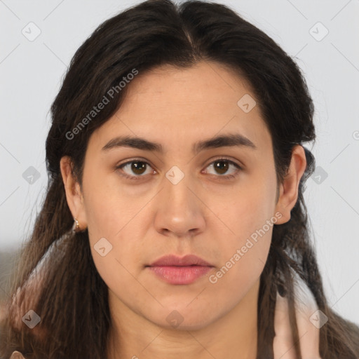 Neutral white young-adult female with long  brown hair and brown eyes