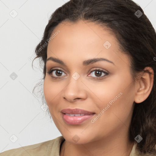 Joyful latino young-adult female with medium  brown hair and brown eyes