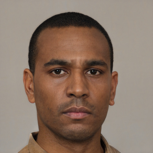 Neutral black young-adult male with short  black hair and brown eyes