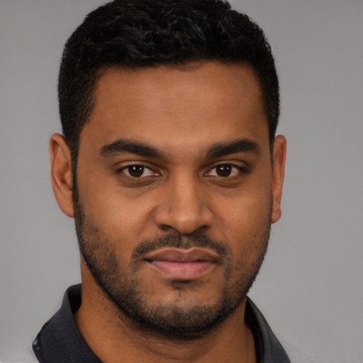 Neutral black young-adult male with short  brown hair and brown eyes