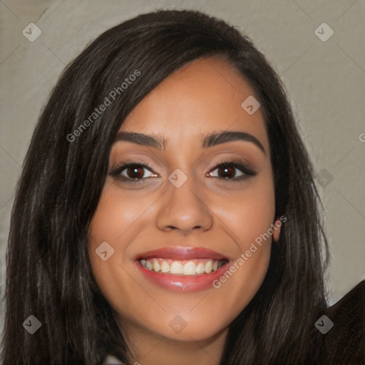 Joyful latino young-adult female with long  black hair and brown eyes