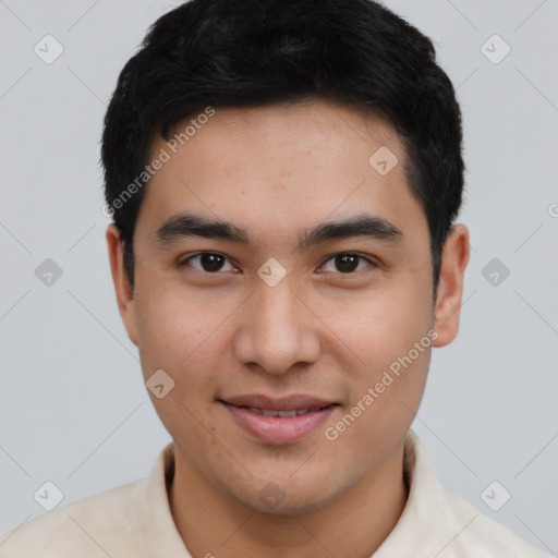 Joyful asian young-adult male with short  brown hair and brown eyes