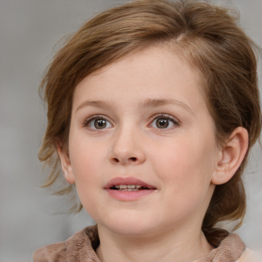 Joyful white child female with medium  brown hair and blue eyes