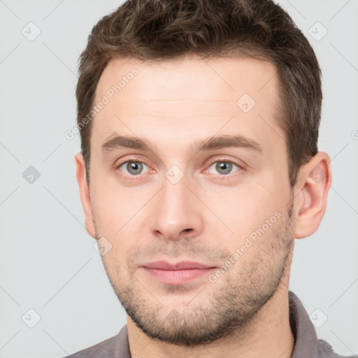 Neutral white young-adult male with short  brown hair and grey eyes