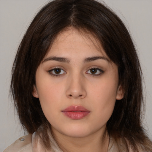 Neutral white young-adult female with medium  brown hair and brown eyes