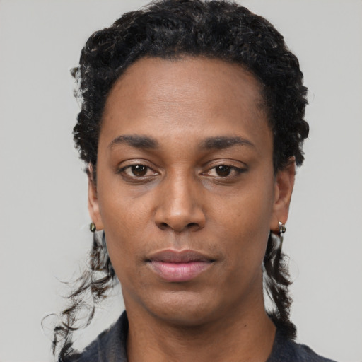 Neutral black young-adult female with short  black hair and brown eyes