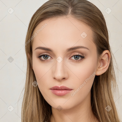 Neutral white young-adult female with long  brown hair and brown eyes