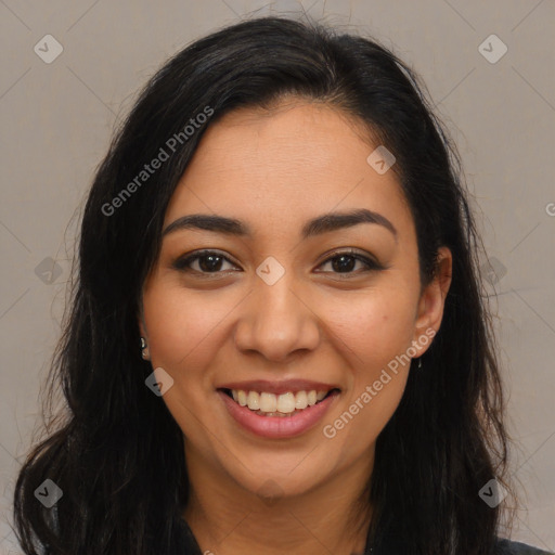 Joyful latino young-adult female with long  brown hair and brown eyes