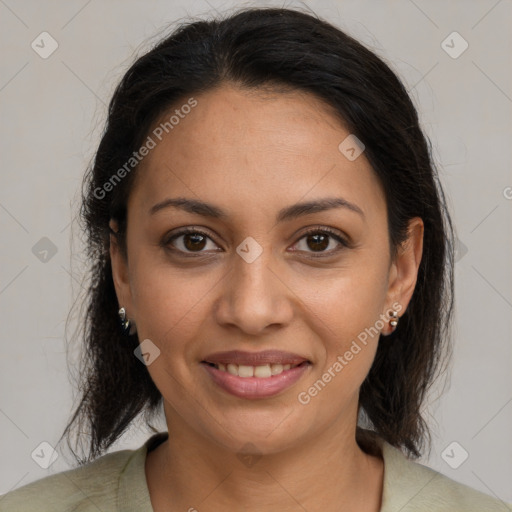 Joyful latino young-adult female with medium  brown hair and brown eyes