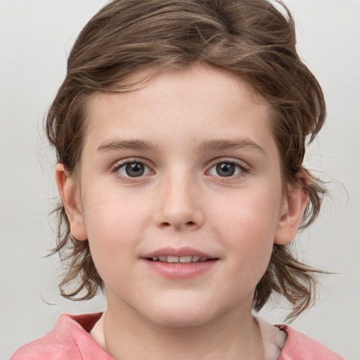 Joyful white child female with medium  brown hair and grey eyes