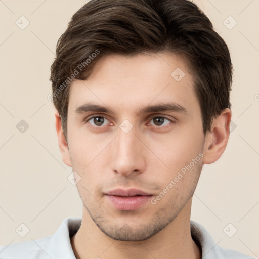 Neutral white young-adult male with short  brown hair and brown eyes