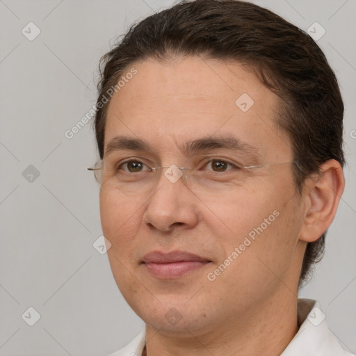 Joyful white adult male with short  brown hair and brown eyes