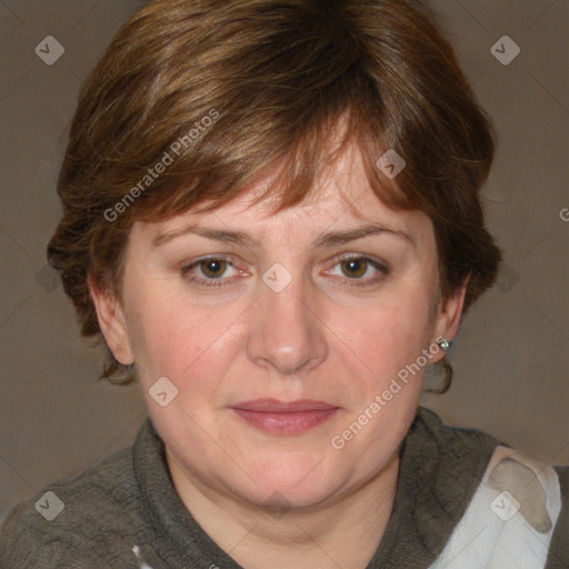 Joyful white adult female with medium  brown hair and blue eyes